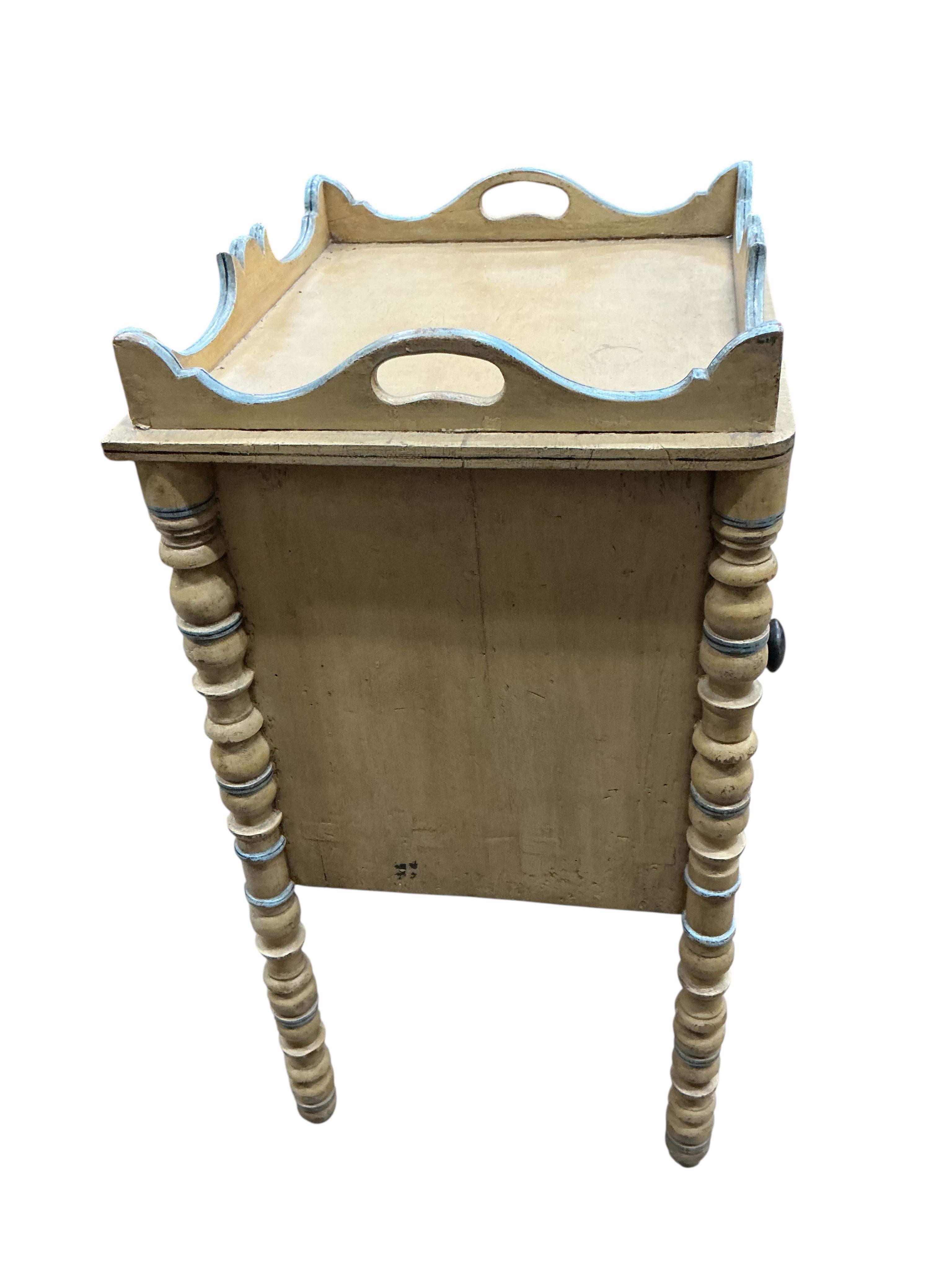 A 19th century painted pine tray top bedside cabinet, width 38cm, depth 35cm, height 71cm